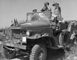 Adm. Lord Louis Mountbatten observing Mandalay from a distance aboard a WC command car, Burma, 13-18 Jan 1945. (Imperial War Museum)