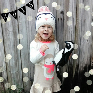 cute girl in peguin themed clothing