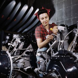 Woman_working_on_an_airplane_motor_at_North_American_Aviation,_Inc.,_plant_in_Calif (1)