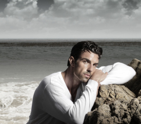 Chiseled jaw guy by ocean