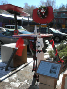 Sculpture in Manitou Springs, date uncertain. At some point after 1999 the chair was painted red. Photo from the Manitou Springs Arts Council.