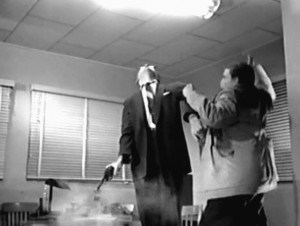 Orville Sherman (left) in The Brain Eaters.
