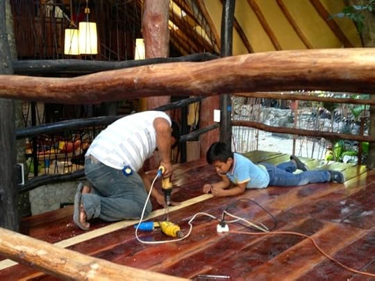 Don Jorge's son learning the trade from his father.