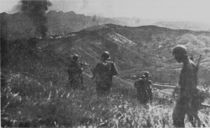 US troops on hill overlooking Damortis-Rosario Road on Luzon. (US Army Center of Military History)