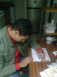 Alton Taylor signing posters.