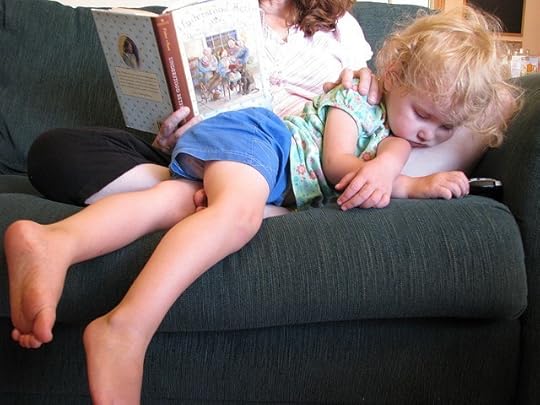 August, 2008. Heart in my throat, looking at this photo today—now I'm reading that same book to this wee girl!