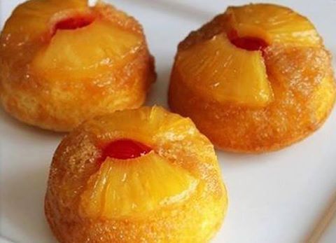PINEAPPLE UPSIDE DOWN CUPCAKES Ingredients 1 can (20 oz) sliced or crushed pineapple, drained, juice reserved 1 box yellow cake mix 1/2 cup vegetable oil 3 eggs 1/3 cup butter, melted 2/3 cup packed brown sugar 12 maraschino cherries, cut in half Directions 1. Heat oven to 350°F. Spray 24 regular-size muffin cups with cooking spray. 2. Cut each pineapple slice into 4 pieces; set aside. In large bowl, beat cake mix, oil, eggs and reserved pineapple juice with electric mixer on low speed 30 seconds. Beat on medium speed 2 minutes, scraping bowl occasionally. 3. In small bowl, stir together melted butter and brown sugar. Spoon 1 1/2 teaspoons butter mixture into each muffin cup. Top each with 2 pineapple pieces or crushed pineapple. Place cherry half, cut side up, in center of pineapple. Spoon 1/4 cup batter into each cup. 4. Bake 20 to 25 minutes or until toothpick inserted in center comes out clean. Cool 5 minutes. Run knife around edge of cupcakes to loosen; invert onto cookie sheet. Serve warm.