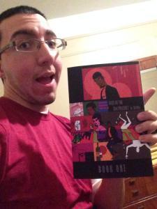 Nick Lopez, a Christmas Holiday participant poses with his copy of TO23P.