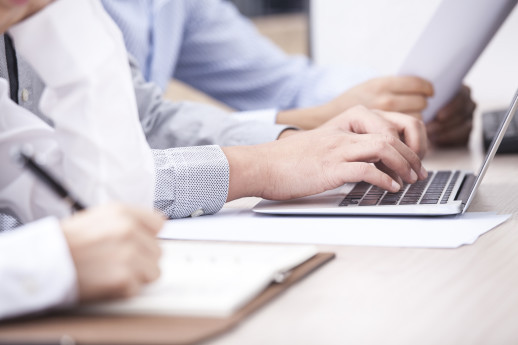 Businesspeople Working at Office Desk