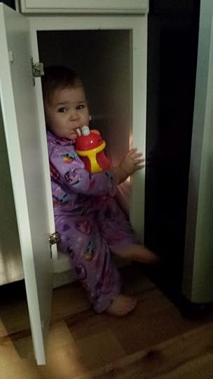 Playing in Her Cupboard