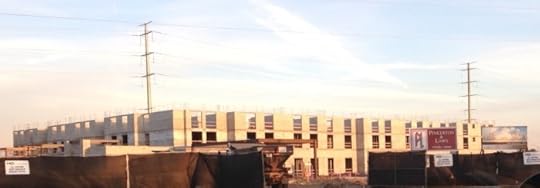 Work progresses at the site of TownePlace Suites at Flamingo Crossings. When completed, there will be 250 suites and studios in this building. (Photo by Julia Mascardo)