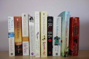 My book on shelf with others