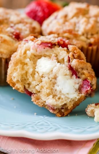 These Strawberry Cheesecake Muffins are filled to the brim with strawberries and topped with a delicious streusel topping. The cheesecake filling is the best part!
