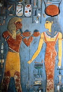 Pharaoh offering wine to Isis