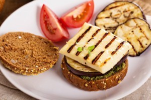 Vegetarian burger with cheese, eggplant and pesto