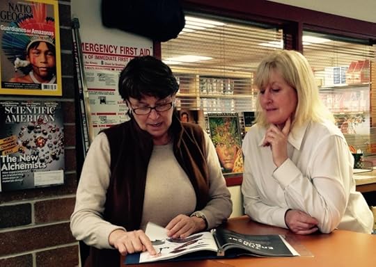 English teacher Jean Croxton collaborates with Teacher Librarian Shaun Gant.