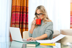 woman working on laptop at home
