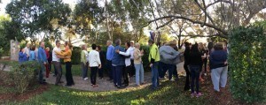 Piero Falci and Rivera Sun swap a hug after the Silent Peace Walk in Coral Springs, FL