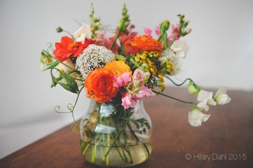 Bouquet including: sweet peas, marigold buds and snapdragons