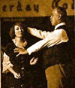 Smith Wigglesworth, an evangelist during the late 1800's - 1942, praying for a woman.