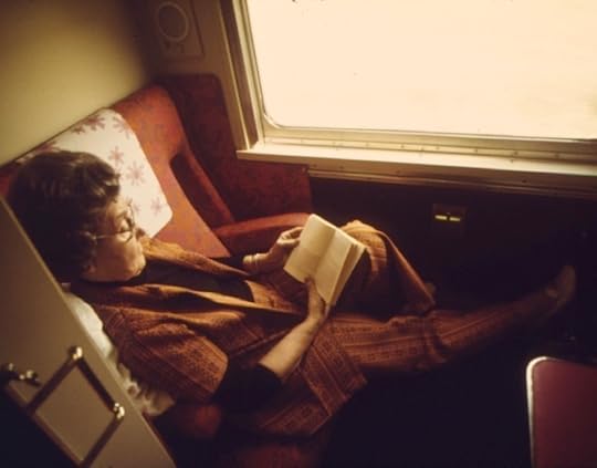 A_PASSENGER_ON_THE_LONE_STAR_PASSES_THE_TIME_READING_IN_HER_COMPARTMENT_AS_THE_TRAIN_CROSSES_OKLAHOMA_ENROUTE_FROM..._-_NARA_-_556033