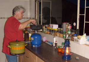 Val cooking macaroni & cheese for supper