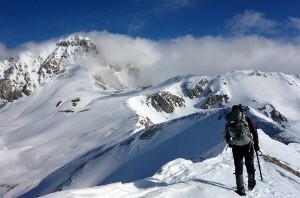 Traversing the ridge above Campo Imperatore with Corno Grande up ahead