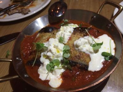 Rolled eggplant with ricotta and prosciutto, tomato, stracciatella
