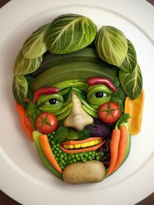 The face of an elderly man, artistically made using only raw vegetables