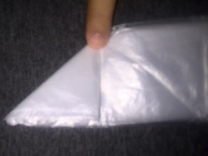 How to Fold a Plastic Bag to Maximize Space (4)
