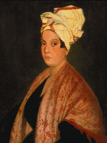 1920 painting of Marie Laveau (1794–1881) by Frank Schneider, based on an 1835 painting (now lost?) by George Catlin. Louisiana State Museum, New Orleans. Public domain via Wikimedia Commons.