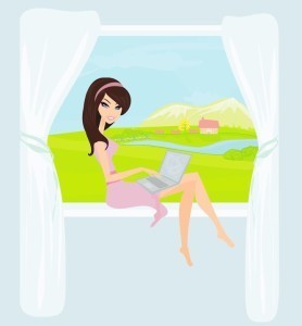 girl at computer in window - 123rf