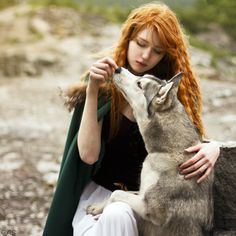A young lady with a special connection with animals. Maybe she grew up with them in the wild.