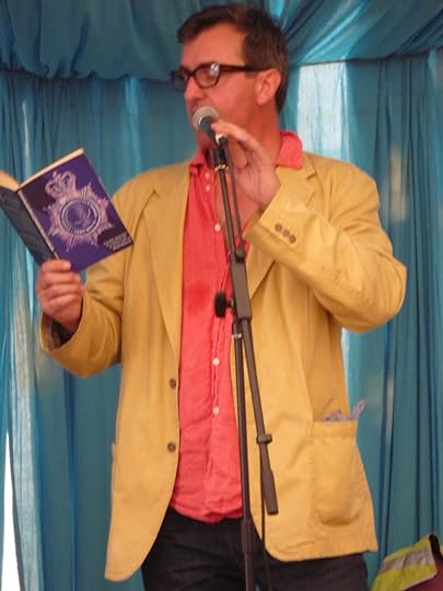 Tony White reading at Glastonbury Festival