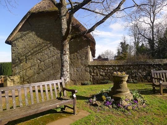 Spring flowers by the church yard gate