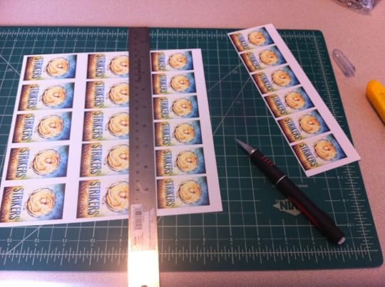 I started cutting them all precise-like with my craft knife, but then I didn't like the sharp edges. I switched to a really good pair of craft scissors. Only do that if you can cut a long straight line with scissors well. It will show up if it's wavy at all.