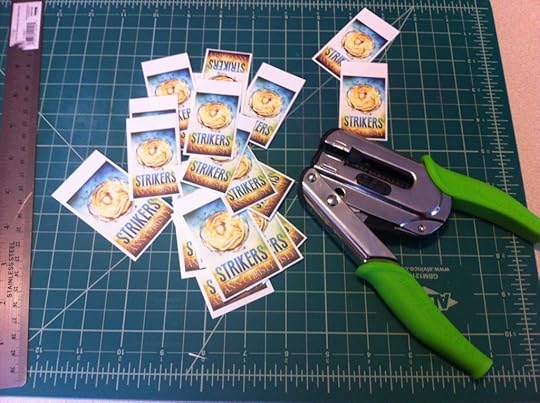 Be sure to leave about a half inch of space above your book logo so that you can punch your holes with plenty of room around it.