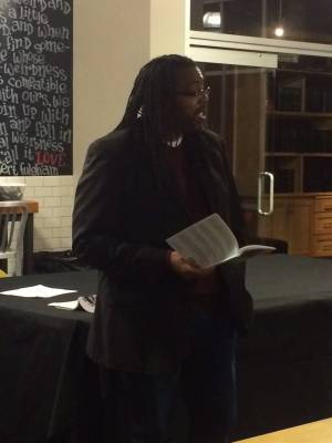 Poet Quraysh Ali Lansana reading at the Festival kick-off event