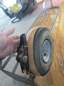 Wrap ratcheting strap around tire