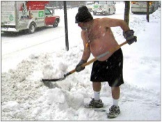 picture of a shirtless man shoveling snow