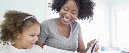 PARENTS READING TO CHILD