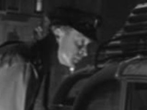 Michael Caine in Day the Earth Caught Fire as Checkpoint Policeman (uncredited)
