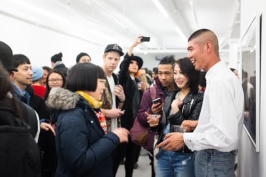 Ren Hang at the opening of 