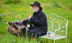 Terry Pratchett and a pig at Hay Festival 2012