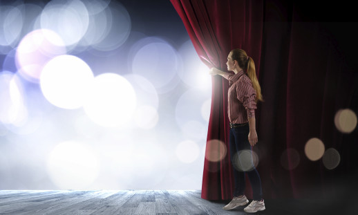 Girl opening curtain