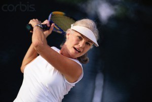 Middle-Aged Woman Playing Tennis