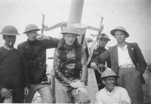 Gun crew aboard SS Clan Murdoch, c. 1940. Lawrance Wilfred Gibbins, Second Officer and Gunnery Officer, is second from the left (photographer unknown).