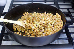 add drained chickpeas, spices, zest
