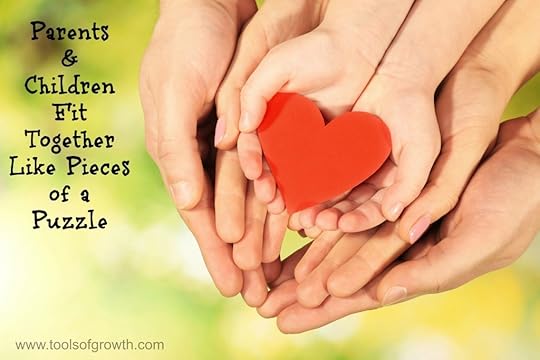 Red heart in family hands on bright background