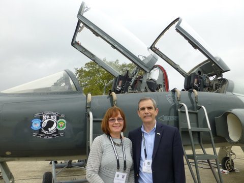 Lee at the Freedom Flyer running with his wife, Mary, and his old airplane, the T-38 Talon.